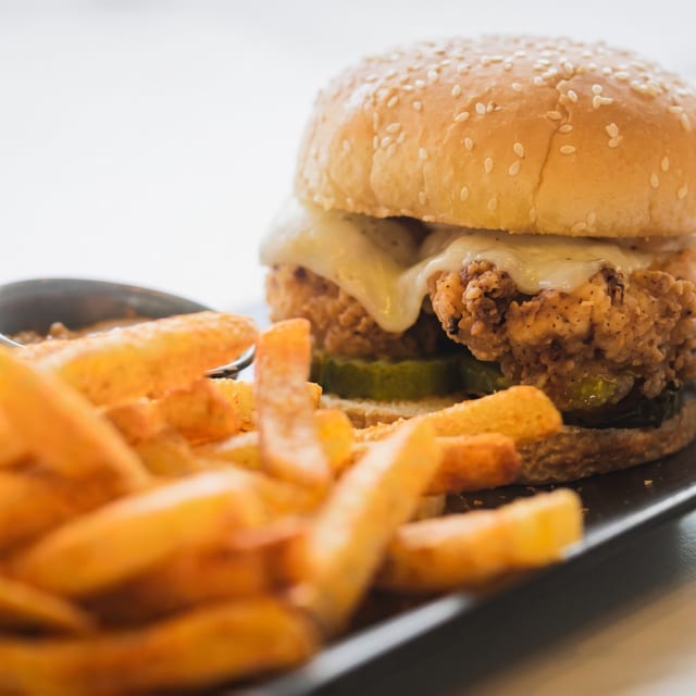 Crispy fried chicken burger with seasoned fries